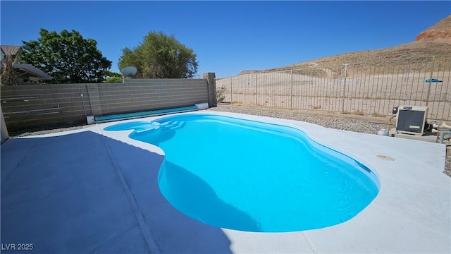 83 Rock Run St, Las Vegas, NV 89148 - view of pool with a patio area, a fenced in pool, and a fenced backyard