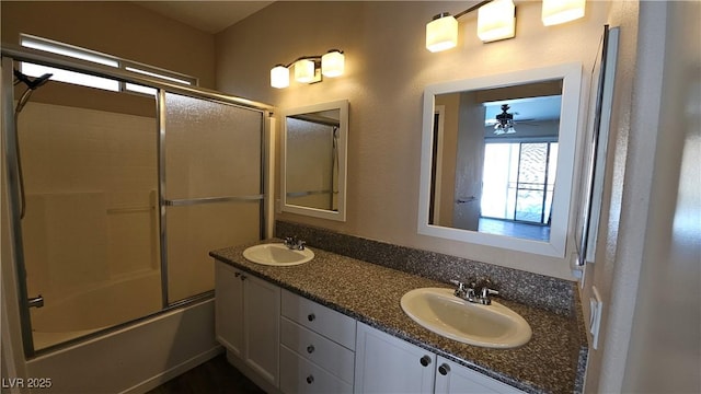 83 Rock Run St, Las Vegas, NV 89148 - full bathroom with enclosed tub / shower combo, a sink, and double vanity
