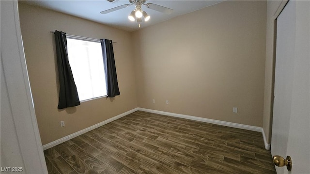 83 Rock Run St, Las Vegas, NV 89148 - spare room featuring a ceiling fan, baseboards, and dark wood-style flooring