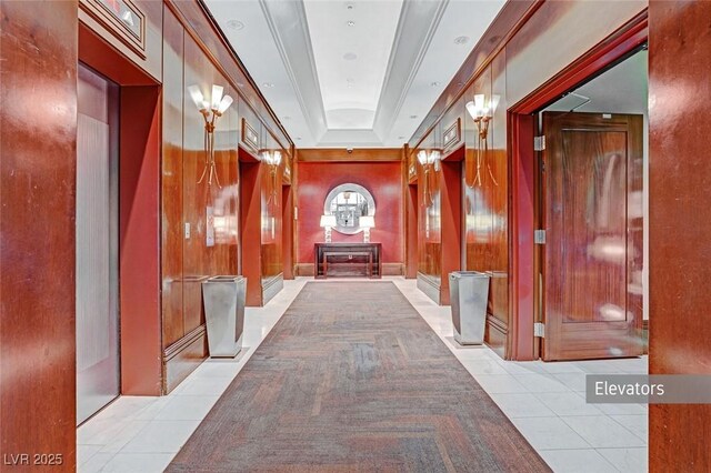 135 E Harmon Ave Unit 3620, Las Vegas, NV 89109 - hall with a tray ceiling and light tile patterned floors