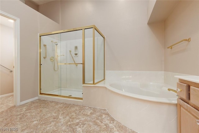 full bathroom featuring a garden tub and a stall shower