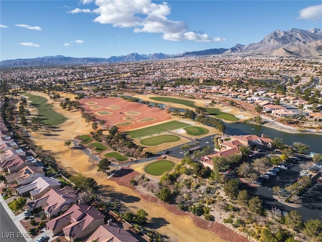 aerial view with a water and mountain view, golf course view, and a residential view