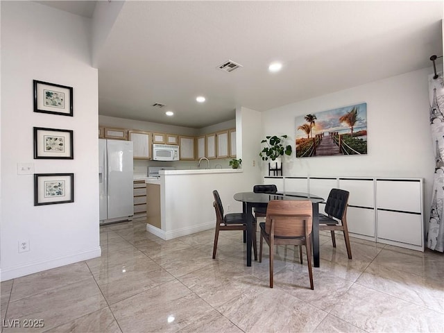 dining area with recessed lighting, baseboards, and visible vents