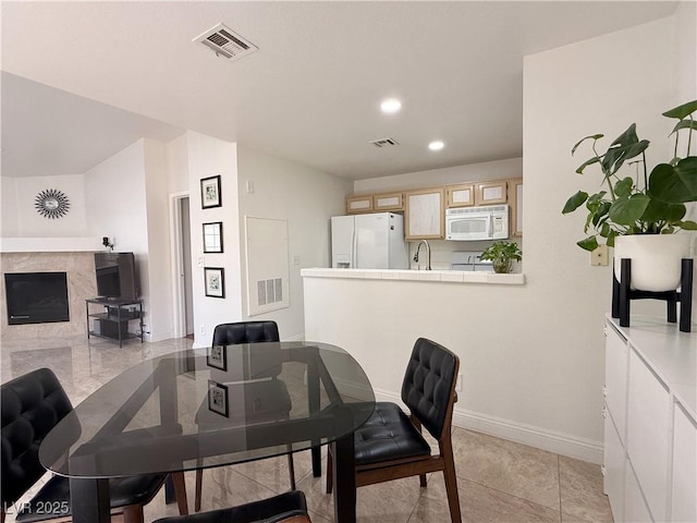 dining area featuring recessed lighting, baseboards, and visible vents