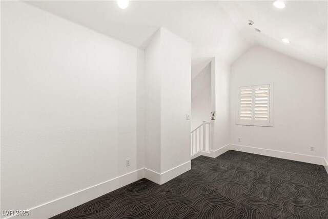bonus room with baseboards, recessed lighting, dark carpet, and vaulted ceiling