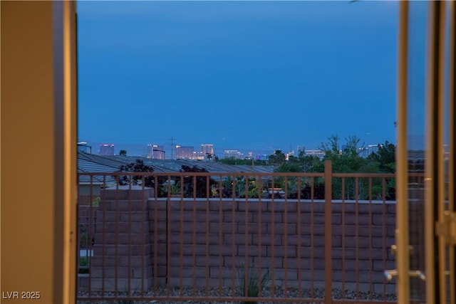 exterior space with a view of city and a balcony