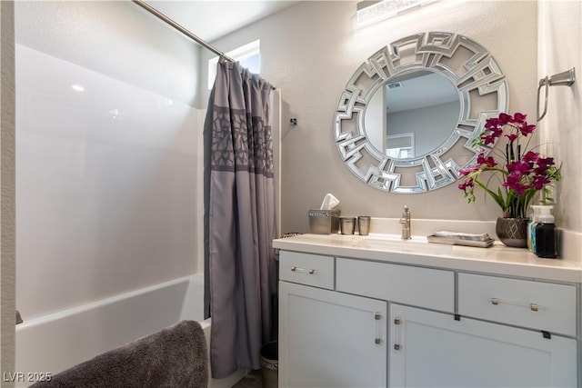 full bath with vanity and shower / bathtub combination with curtain