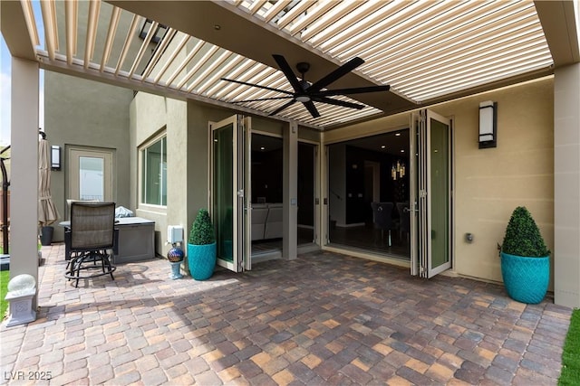 view of patio / terrace featuring a ceiling fan