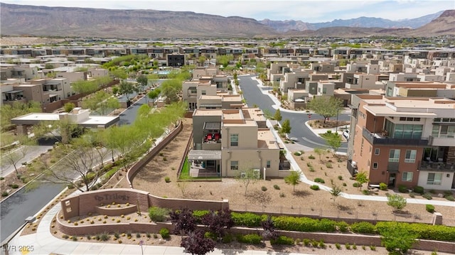 aerial view featuring a mountain view and a residential view