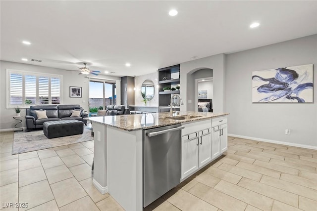 5852 Ireland Ridge Ct, Las Vegas, NV 89149 - kitchen with dishwasher, a sink, recessed lighting, a ceiling fan, and white cabinets