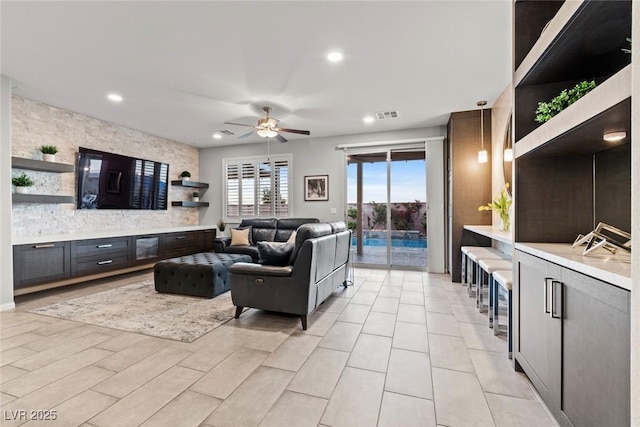 5852 Ireland Ridge Ct, Las Vegas, NV 89149 - living area featuring ceiling fan and recessed lighting