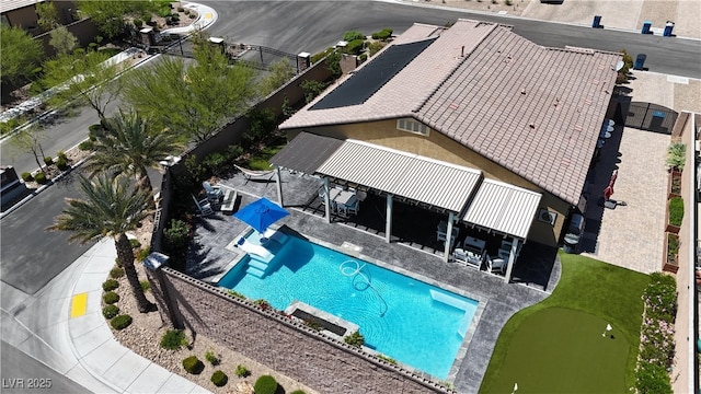 5852 Ireland Ridge Ct, Las Vegas, NV 89149 - view of swimming pool featuring a putting area and a patio