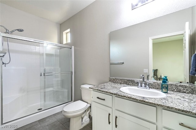 5852 Ireland Ridge Ct, Las Vegas, NV 89149 - full bathroom with a shower stall, toilet, tile patterned flooring, and vanity