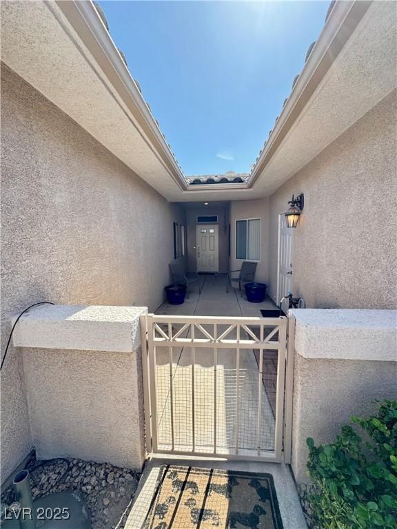 exterior space with stucco siding