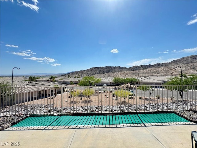 view of patio / terrace with a mountain view