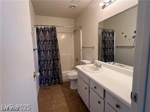 full bath featuring toilet, visible vents, tile patterned flooring, shower / bath combination with curtain, and vanity