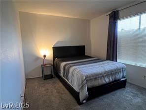 bedroom featuring carpet floors