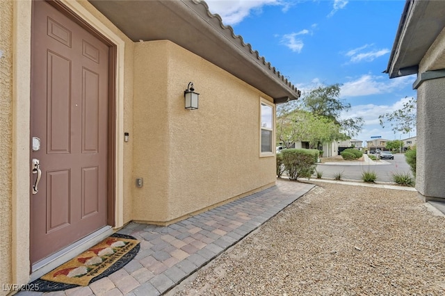 2104 Leatherbridge Ct, North Las Vegas, NV 89081 - property entrance featuring stucco siding