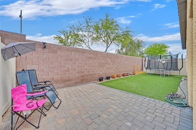 2104 Leatherbridge Ct, North Las Vegas, NV 89081 - view of patio with a trampoline