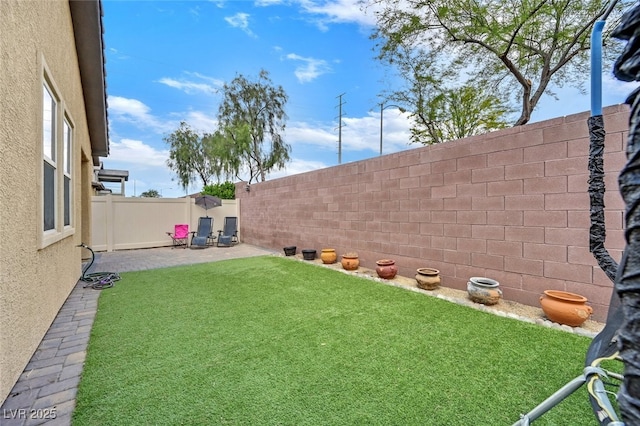 2104 Leatherbridge Ct, North Las Vegas, NV 89081 - view of yard with a patio area