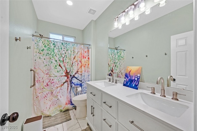 2104 Leatherbridge Ct, North Las Vegas, NV 89081 - full bath featuring toilet, double vanity, and a shower with curtain