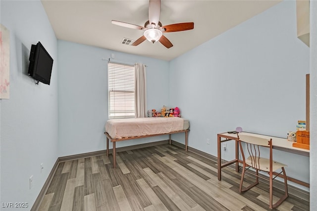 2104 Leatherbridge Ct, North Las Vegas, NV 89081 - bedroom with wood finished floors and baseboards