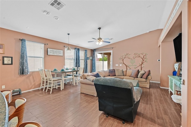 2104 Leatherbridge Ct, North Las Vegas, NV 89081 - living room featuring light wood-style flooring, a ceiling fan, baseboards, and vaulted ceiling