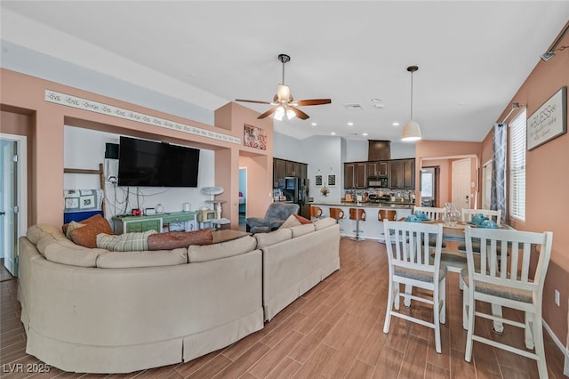 2104 Leatherbridge Ct, North Las Vegas, NV 89081 - living area with a ceiling fan, light wood-style flooring, and recessed lighting
