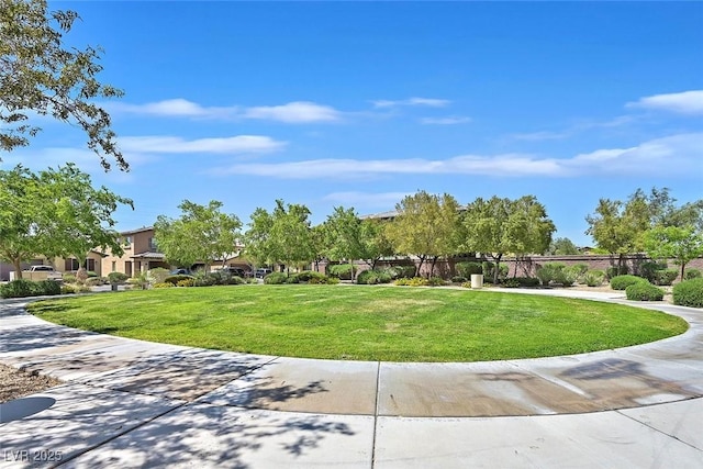 2104 Leatherbridge Ct, North Las Vegas, NV 89081 - view of community with a lawn