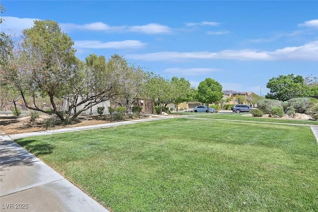 2104 Leatherbridge Ct, North Las Vegas, NV 89081 - view of home's community with a lawn