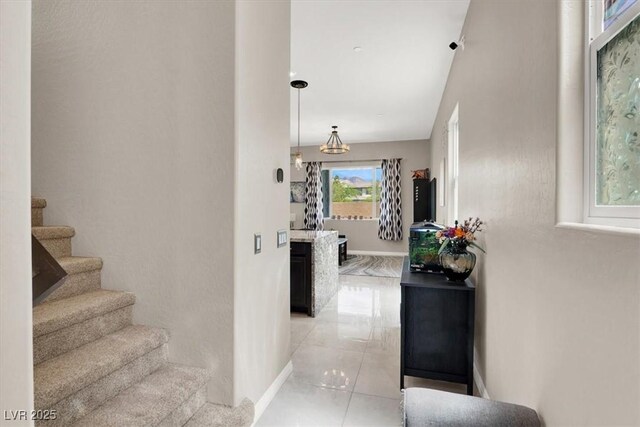 12426 Oregon Cherry Ave, Las Vegas, NV 89138 - corridor featuring stairway and light tile patterned floors