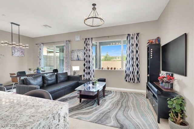 12426 Oregon Cherry Ave, Las Vegas, NV 89138 - living room with a chandelier