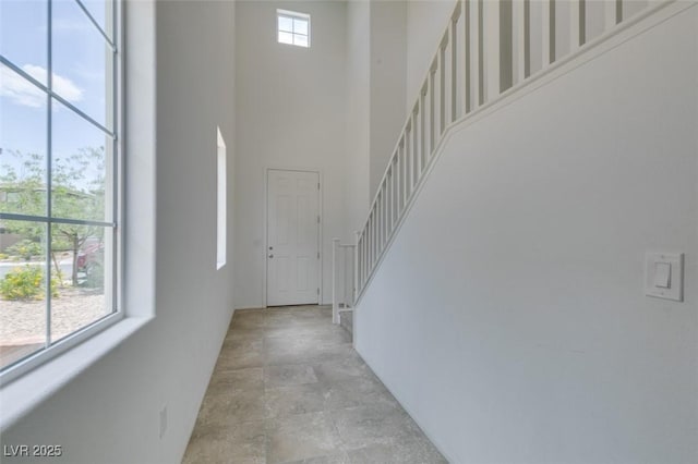 1004 Huckburn Ave, Henderson, NV 89015 - interior space featuring a high ceiling, stone finish floor, and stairs