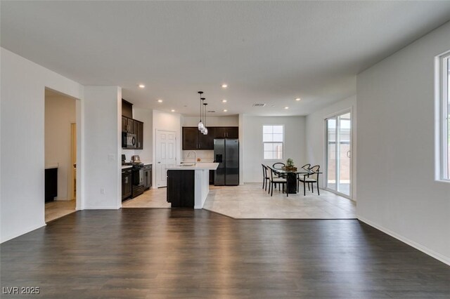 1004 Huckburn Ave, Henderson, NV 89015 - living area with baseboards, recessed lighting, and light wood-type flooring
