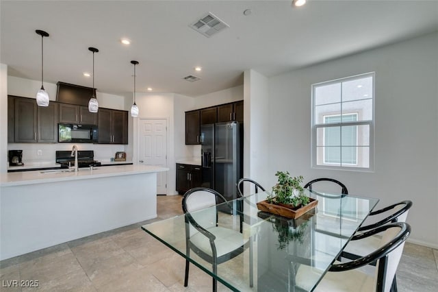 1004 Huckburn Ave, Henderson, NV 89015 - dining area with baseboards, visible vents, and recessed lighting