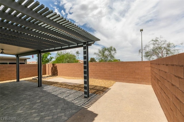 1004 Huckburn Ave, Henderson, NV 89015 - view of patio / terrace featuring a pergola and a fenced backyard