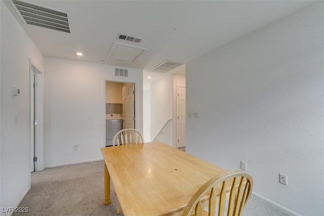 1004 Huckburn Ave, Henderson, NV 89015 - dining space with light colored carpet, washer / clothes dryer, and visible vents