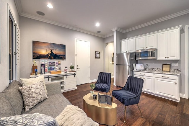 living area with ornamental molding, baseboards, dark wood-style flooring, and recessed lighting
