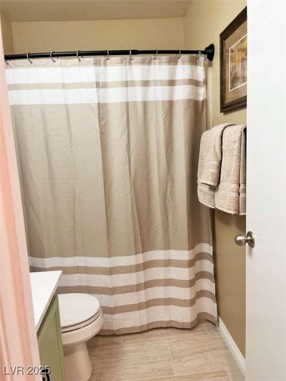 1121 Majestic Canyon St, Henderson, NV 89052 - bathroom featuring toilet, a shower with shower curtain, and vanity