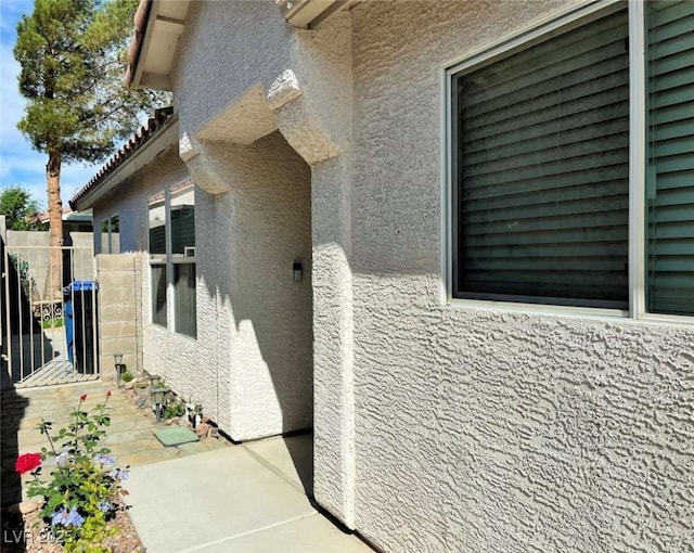 1121 Majestic Canyon St, Henderson, NV 89052 - entrance to property with stucco siding and fence