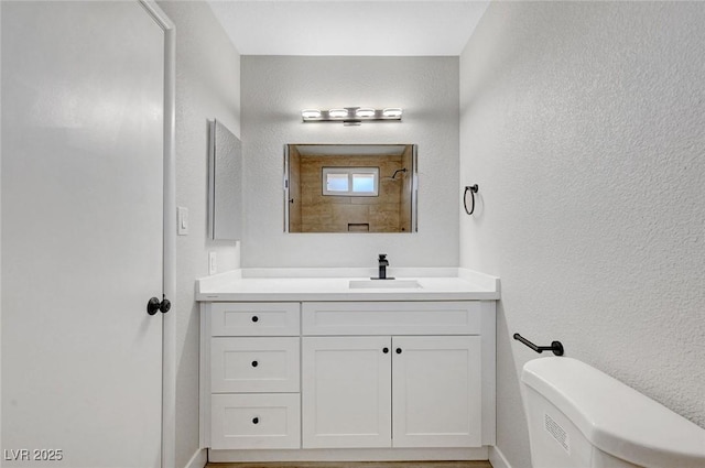 3791 El Camino Rd, Las Vegas, NV 89103 - bathroom featuring vanity and a textured wall