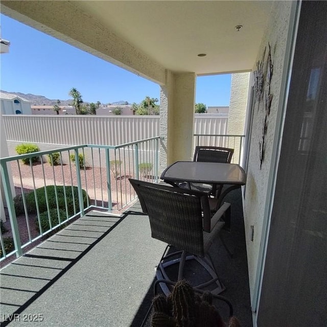 balcony with outdoor dining area