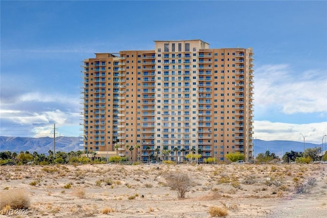 view of building exterior featuring a mountain view