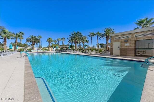 community pool featuring a patio area