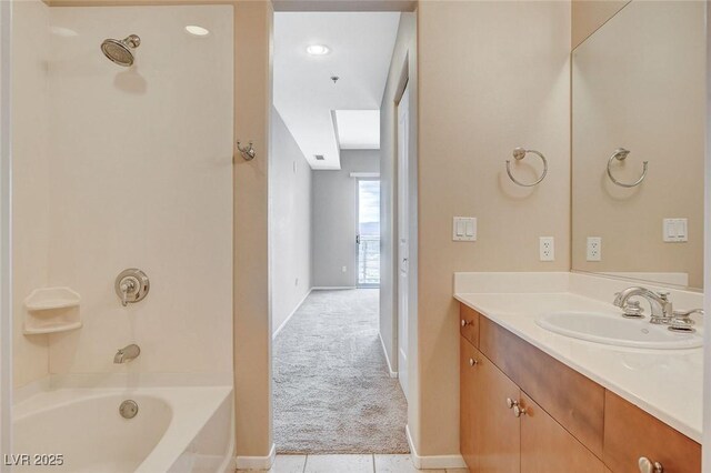 full bathroom with vanity, baseboards, tile patterned floors, and bathtub / shower combination