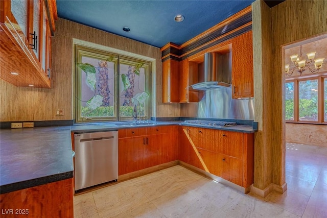 8199 Pinnacle Peak Ave, Las Vegas, NV 89113 - kitchen featuring appliances with stainless steel finishes, wall chimney exhaust hood, a chandelier, and dark countertops