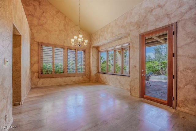8199 Pinnacle Peak Ave, Las Vegas, NV 89113 - spare room with a chandelier and high vaulted ceiling