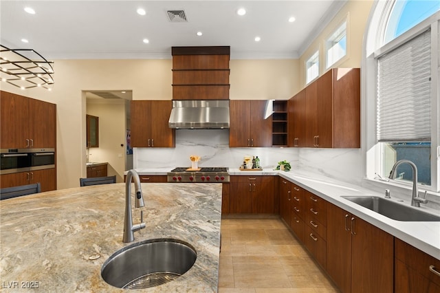 1234 Campbell Dr, Las Vegas, NV 89102 - kitchen featuring wall chimney exhaust hood, tasteful backsplash, open shelves, and a sink