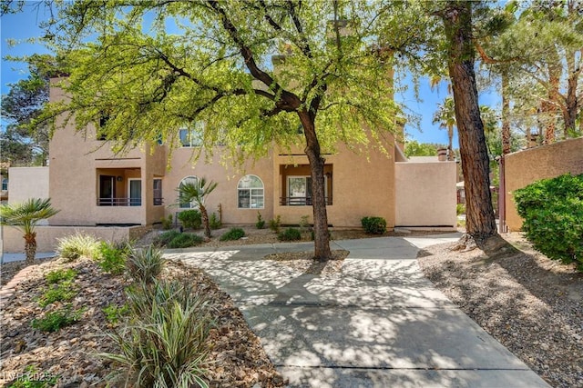 view of front of house featuring stucco siding