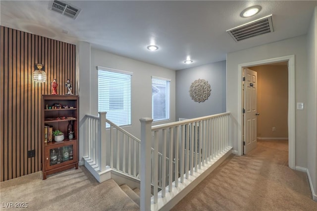 6546 American Flower St, Las Vegas, NV 89148 - hallway with carpet flooring, an upstairs landing, and baseboards